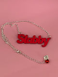 Stabby slogan necklace