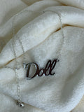 Doll slogan necklace